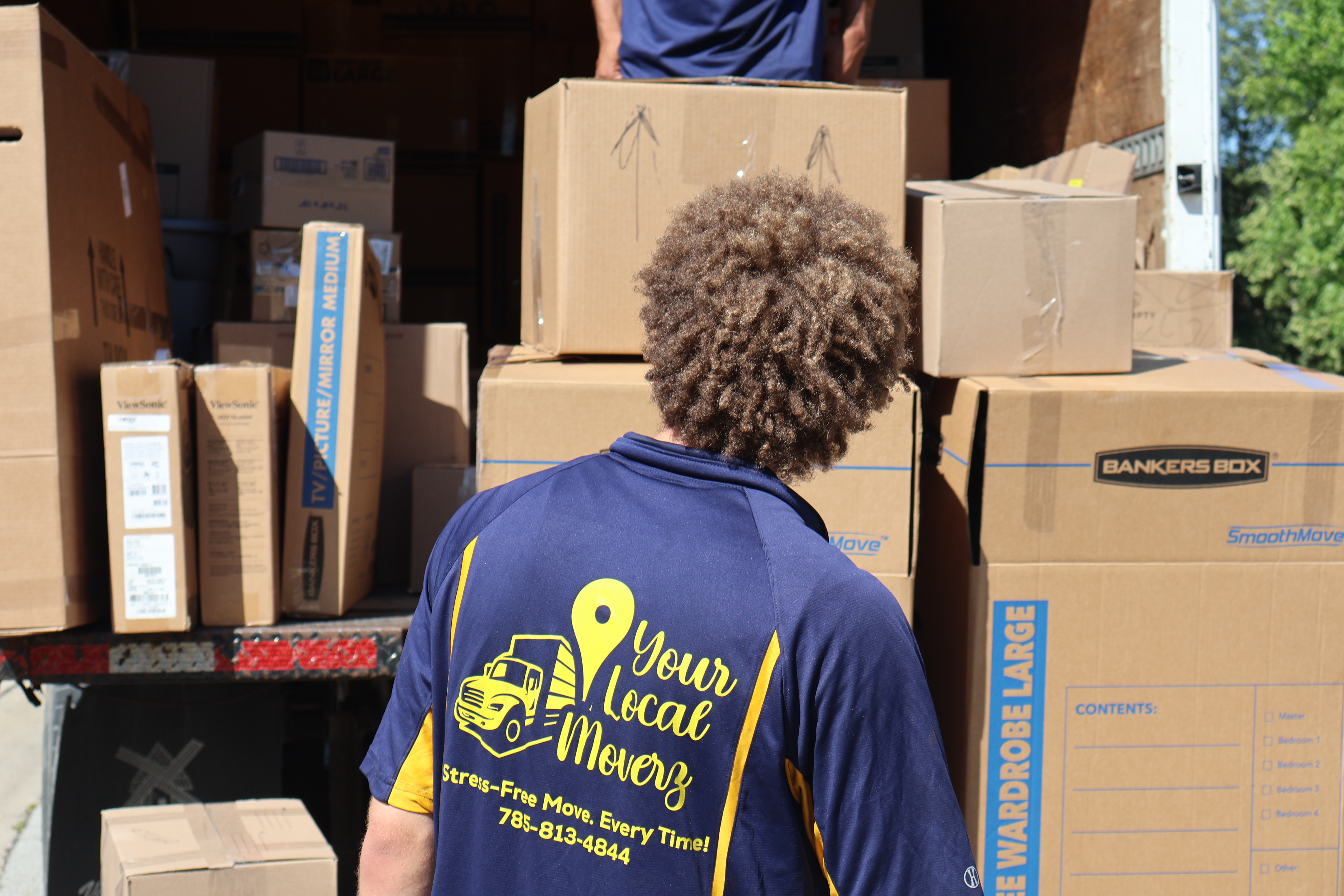 Your Local Moverz in-house crew on a residential moving job